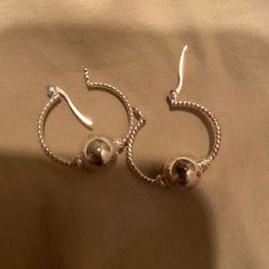 Sterling hoop earrings with ball decor